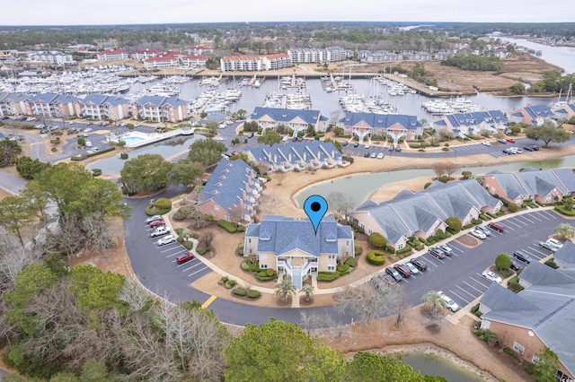 drone / aerial view with a water view