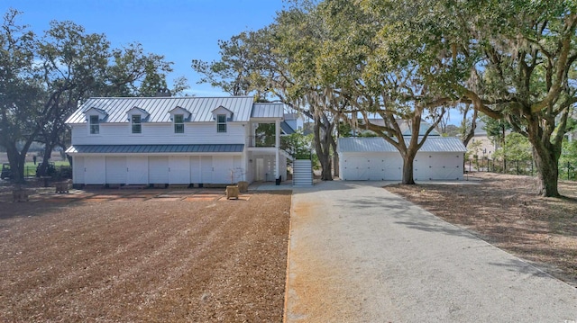 view of front of property with metal roof and a standing seam roof