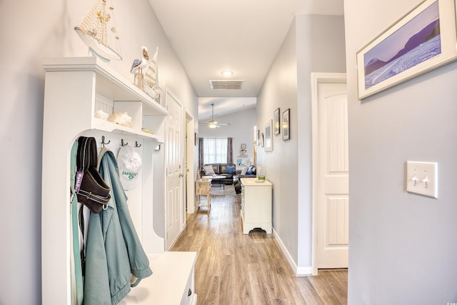 mudroom with ceiling fan and light hardwood / wood-style flooring