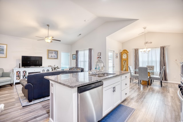 kitchen with sink, white cabinetry, light stone counters, a center island with sink, and dishwasher