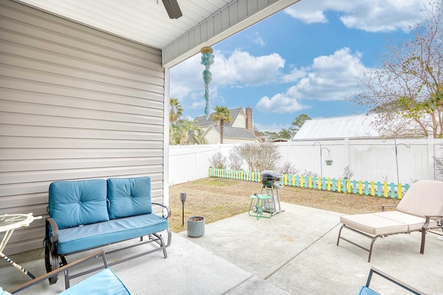 view of patio / terrace featuring ceiling fan