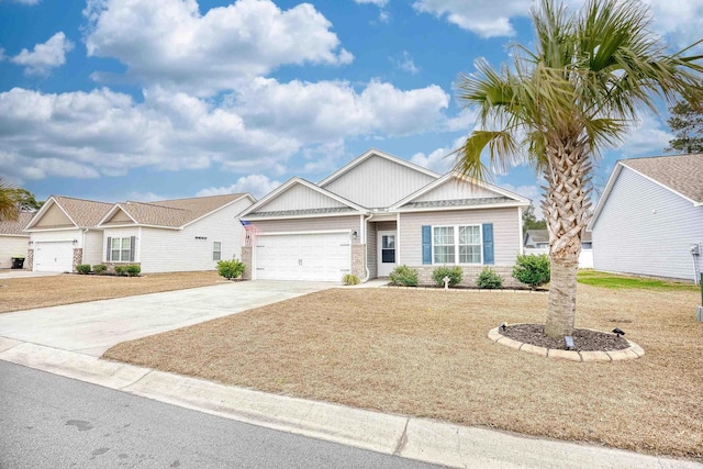 view of front of home with a garage and a front yard