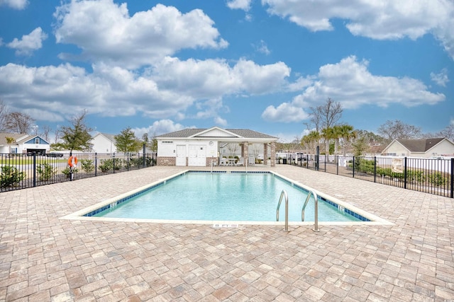 view of swimming pool featuring a patio