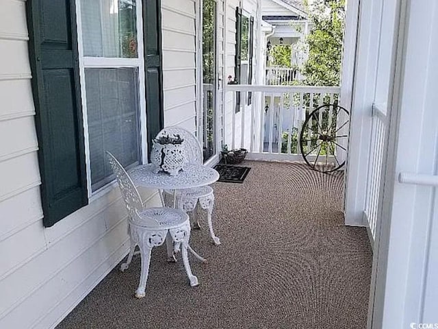 balcony with covered porch