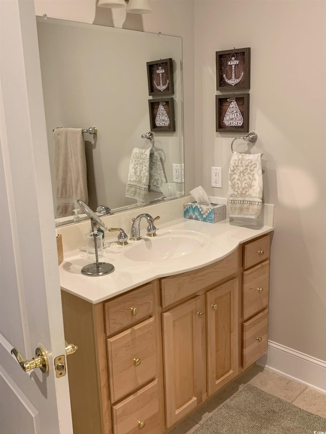 bathroom with vanity and tile patterned floors