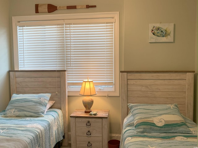 bedroom featuring multiple windows