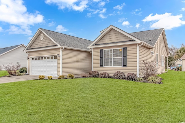 view of front of house featuring an attached garage, driveway, a shingled roof, and a front yard