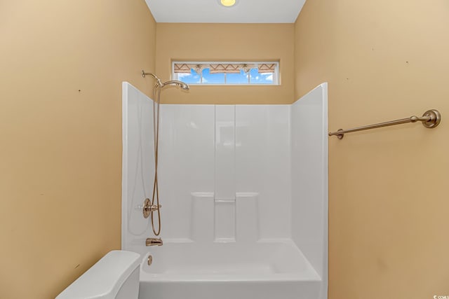 full bath with shower / washtub combination and toilet