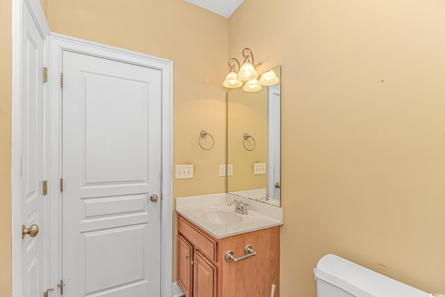 half bath with toilet and vanity