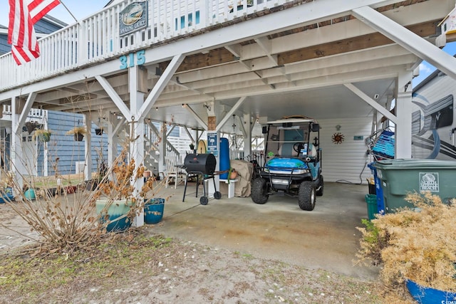 view of parking / parking lot with a carport