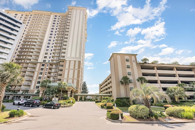 9994 Beach Club Dr Unit 1601, Myrtle Beach, SC 29572 - view of apartment building / complex with uncovered parking