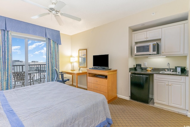 9994 Beach Club Dr Unit 1601, Myrtle Beach, SC 29572 - bedroom with access to exterior, light colored carpet, baseboards, bar with sink, and a ceiling fan