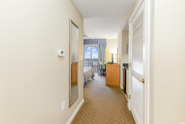 9994 Beach Club Dr Unit 1601, Myrtle Beach, SC 29572 - corridor with baseboards
