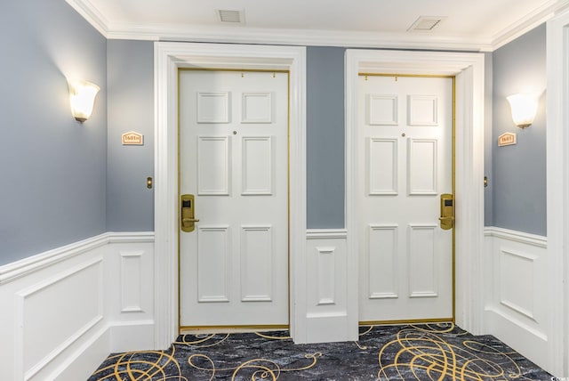 9994 Beach Club Dr Unit 1601, Myrtle Beach, SC 29572 - foyer with ornamental molding, a wainscoted wall, a decorative wall, and dark marble finish flooring