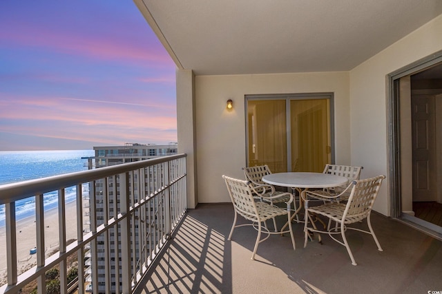 9994 Beach Club Dr Unit 1601, Myrtle Beach, SC 29572 - balcony at dusk featuring a water view