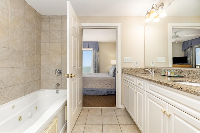 9994 Beach Club Dr Unit 1601, Myrtle Beach, SC 29572 - bathroom with connected bathroom, double vanity, tile patterned flooring, a ceiling fan, and a combined bath / shower with jetted tub