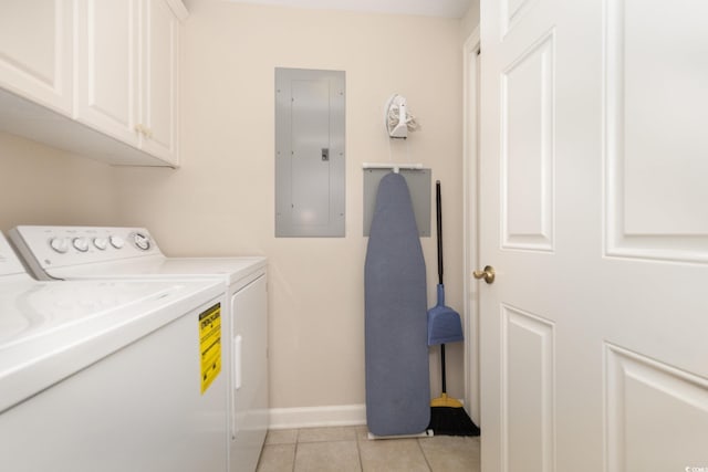 9994 Beach Club Dr Unit 1601, Myrtle Beach, SC 29572 - washroom with electric panel, washer and dryer, cabinet space, baseboards, and light tile patterned floors