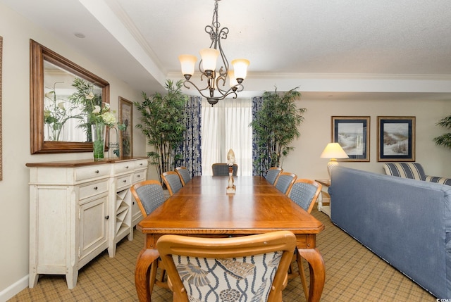 9994 Beach Club Dr Unit 1601, Myrtle Beach, SC 29572 - dining area featuring a chandelier, ornamental molding, and baseboards