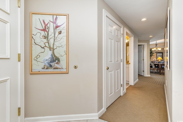 9994 Beach Club Dr Unit 1601, Myrtle Beach, SC 29572 - hallway with a chandelier, light carpet, baseboards, and recessed lighting
