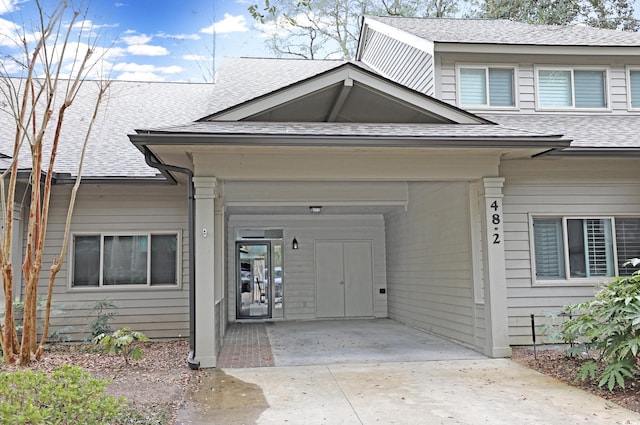 view of front of house with a carport