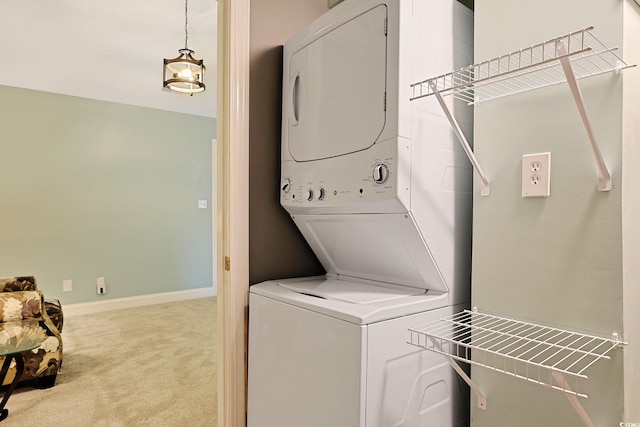 washroom featuring light carpet and stacked washer and clothes dryer