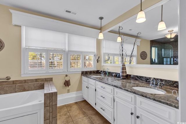 1800 Glenns Bay Rd, Surfside Beach, SC 29575 - bathroom with vanity, tile patterned floors, and a tub