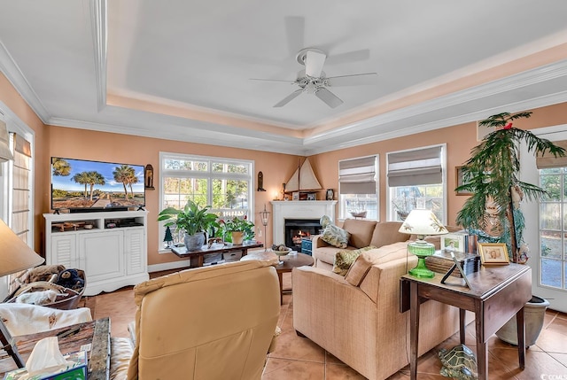 1800 Glenns Bay Rd, Surfside Beach, SC 29575 - tiled living room with a raised ceiling, ornamental molding, a wealth of natural light, and ceiling fan