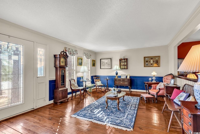 1800 Glenns Bay Rd, Surfside Beach, SC 29575 - living room featuring crown molding, wood-type flooring, and a textured ceiling
