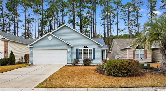 single story home with cooling unit and a garage