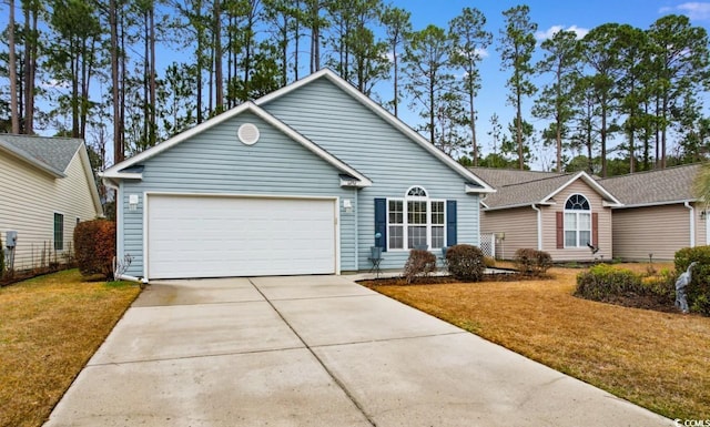 ranch-style home with a garage and a front yard