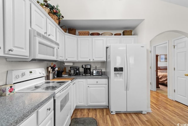 kitchen featuring white cabinetry, white appliances, and light wood-type flooring