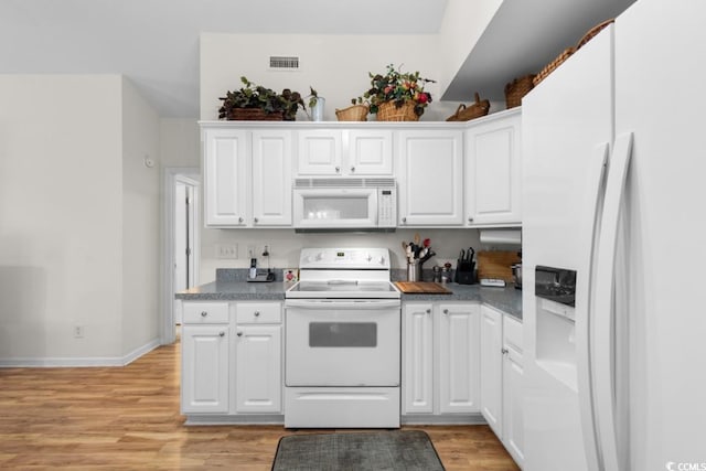 kitchen featuring white cabinetry, white appliances, and light hardwood / wood-style floors