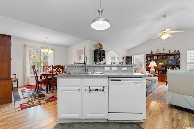 kitchen with pendant lighting, sink, white cabinetry, white dishwasher, and light hardwood / wood-style floors