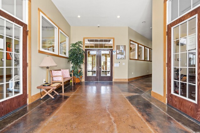 395 S Crow Creek Dr Unit 1418, Calabash, NC 28467 - entrance foyer featuring french doors, concrete flooring, and recessed lighting