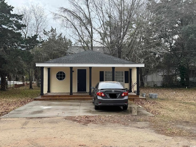 view of outbuilding with covered porch