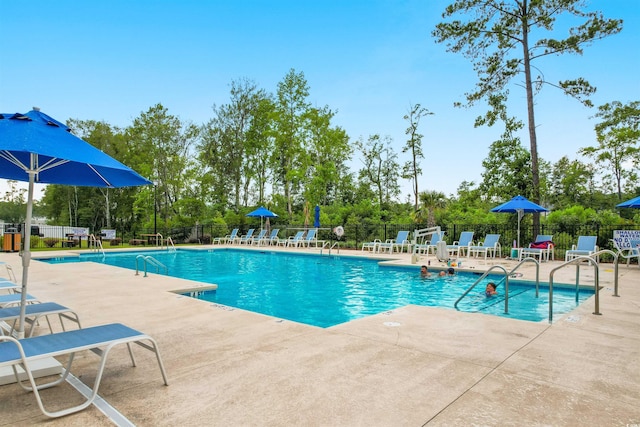 242 Timber Oaks Dr, Myrtle Beach, SC 29588 - community pool featuring a patio area