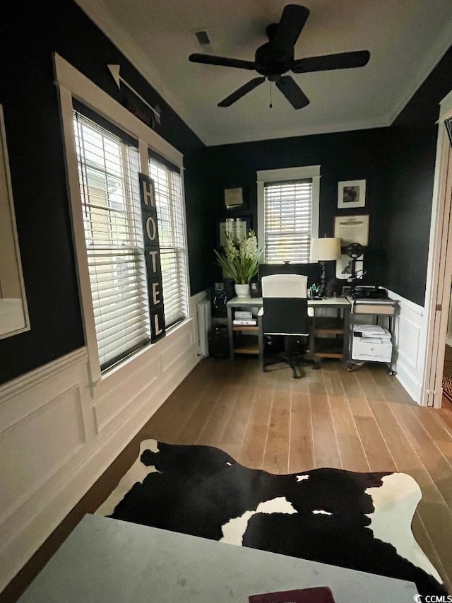 office area with light hardwood / wood-style flooring and ceiling fan