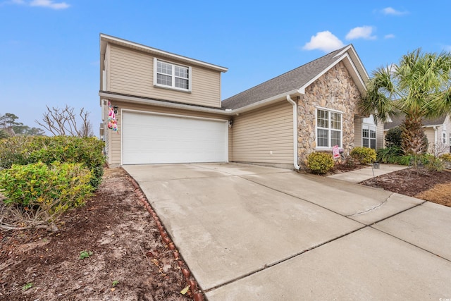 front facade with a garage