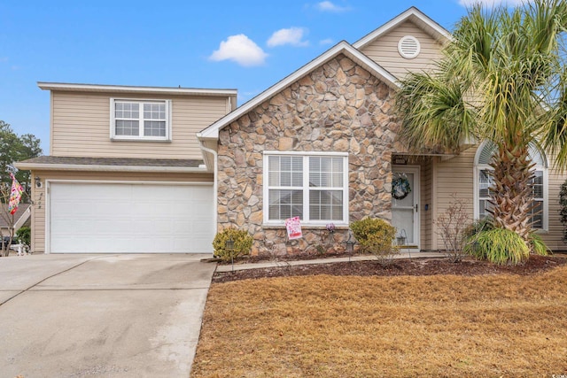 front of property with a garage