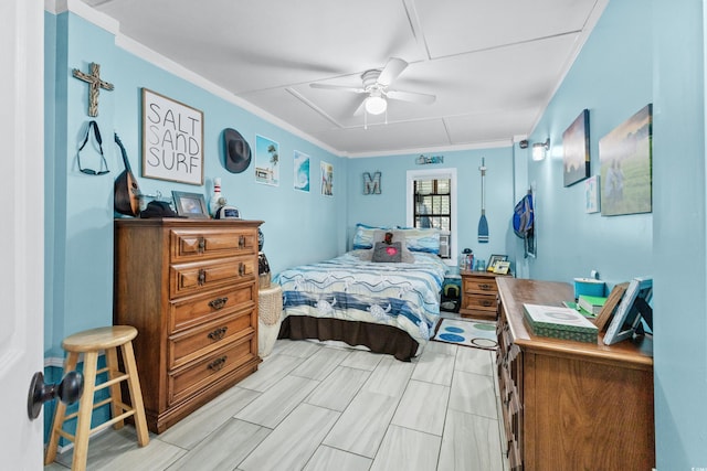 bedroom featuring ceiling fan and crown molding