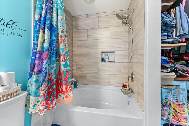 bathroom featuring shower / bathtub combination with curtain