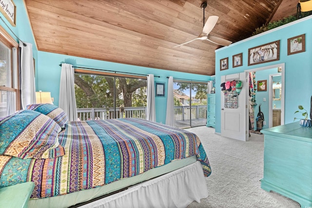 bedroom featuring lofted ceiling, carpet, wooden ceiling, and access to exterior