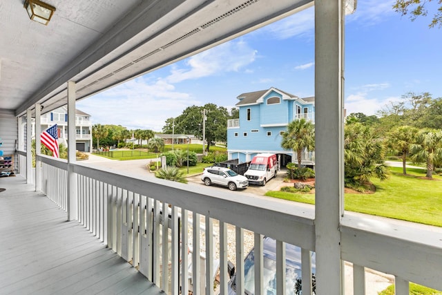 balcony featuring a residential view