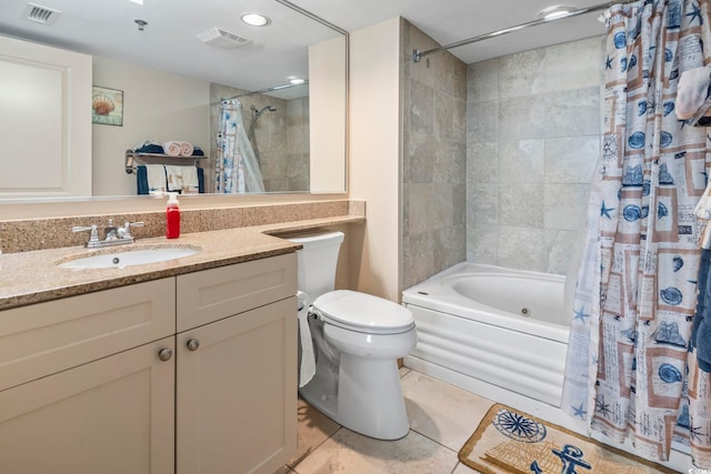 bathroom featuring visible vents, toilet, shower / bath combo with shower curtain, tile patterned floors, and vanity