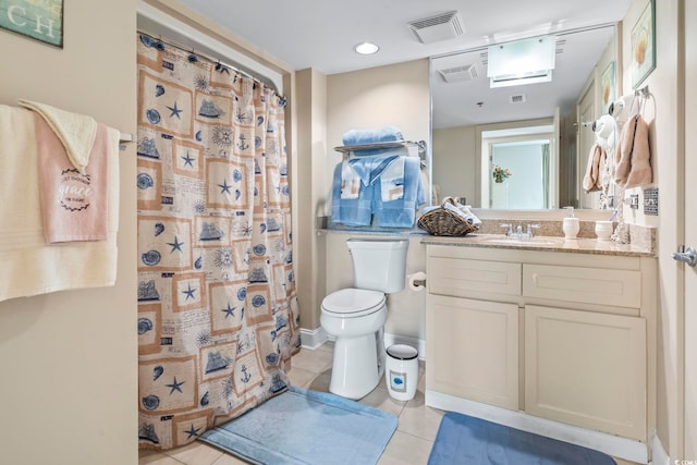 full bath featuring vanity, a shower with shower curtain, visible vents, tile patterned floors, and toilet