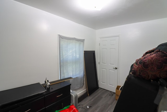 bedroom with wood finished floors