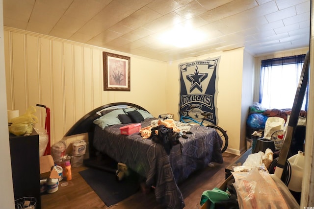 bedroom featuring wood finished floors