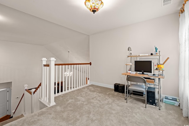 office area featuring carpet flooring and vaulted ceiling