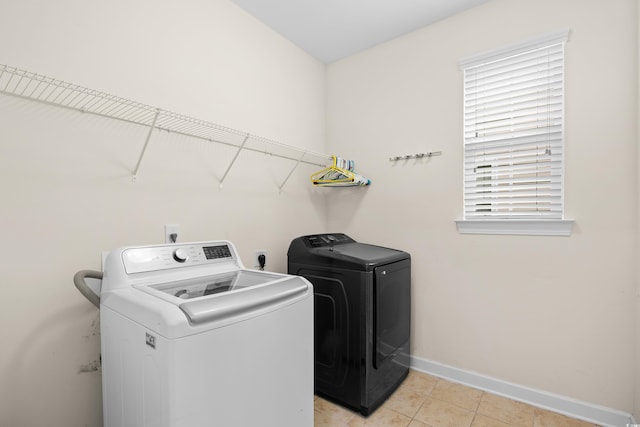 1537 Beaumont Way, Myrtle Beach, SC 29577 - washroom featuring washing machine and clothes dryer, baseboards, and light tile patterned floors