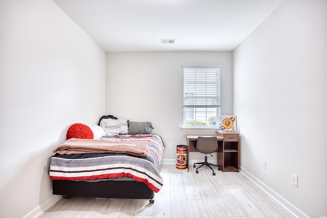 bedroom featuring light hardwood / wood-style floors